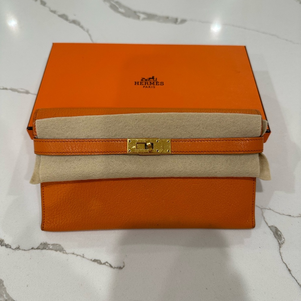 Authentic Hermes Kelly wallet ( Hermes orange with GH)